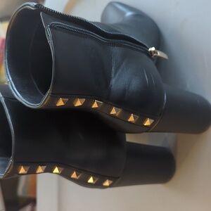 Nine west black boots with gold detail on back